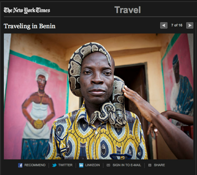 New York Times Travel - Benin - image of a voodon man with a python wrapped around his head . Image © Jason Florio