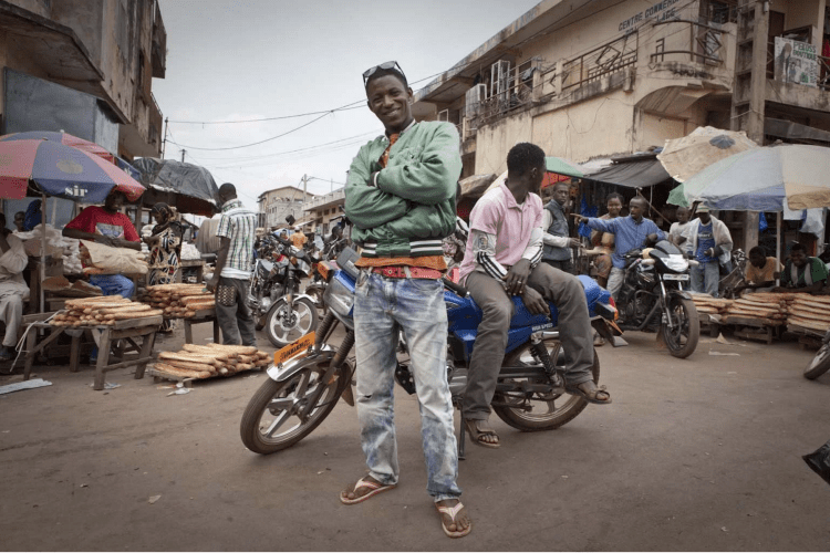 Moto Taxi Boys, Labé, Fouta Djallon, Guinea Conakry. Image ©Jason Florio from the River Gambia Expedition