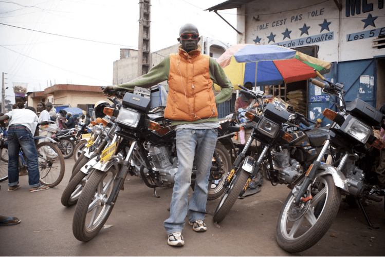 Moto Taxi Boys, Labé, Fouta Djallon, Guinea Conakry. Image ©Jason Florio from the River Gambia Expedition