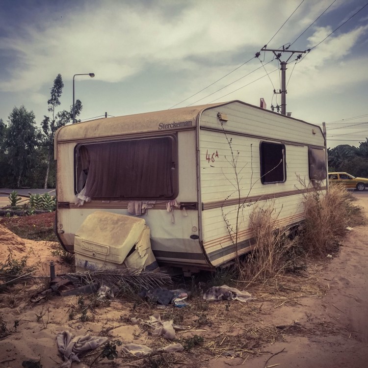 Abandoned caravan, Bertil Harding Highway, The Gambia, West Africa © Helen Jones-Florio
