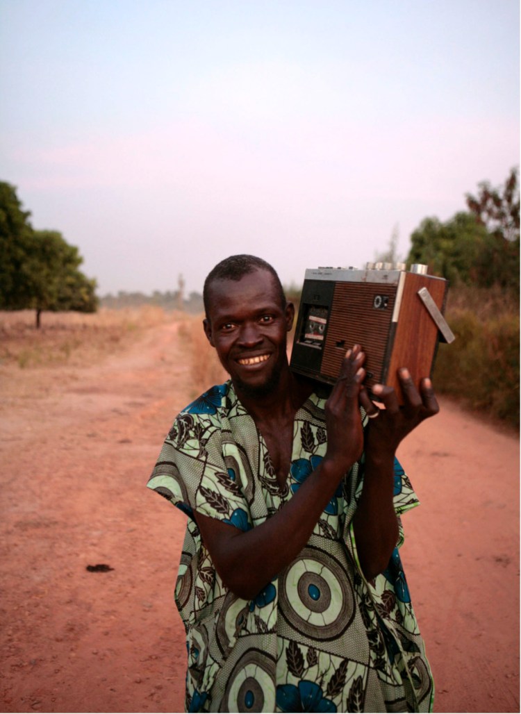 MAN WITH RADIO GAMBIA