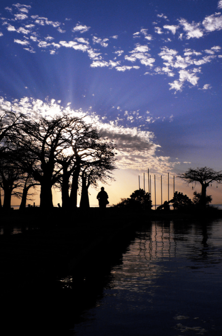 The sun sets over Kunta Kinte Island, River Gambia, The Gambia, West Africa © Helen Jones-Florio