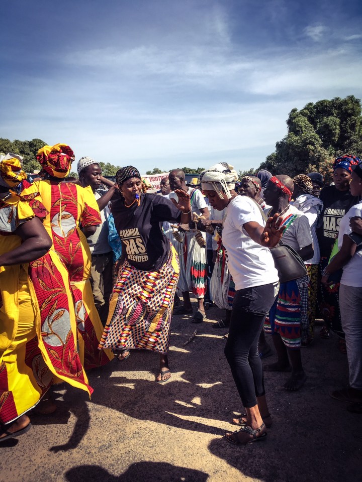 Gambian celebrate the return home of their new president, Adama Barrow ©Helen Jones-Florio 