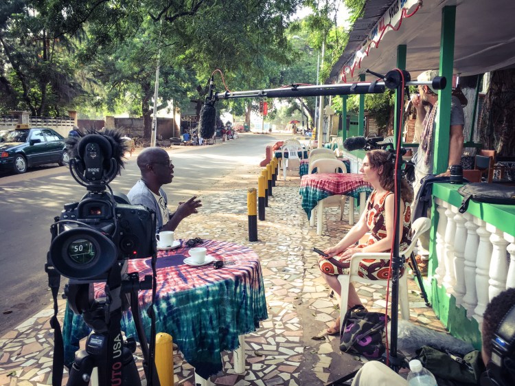 Louise Hunt, write and co-producer, interviews Salieu Taal (#GambiaHasDecided), Saffy J's Restaurant, Bakau ©Helen Jones-Florio