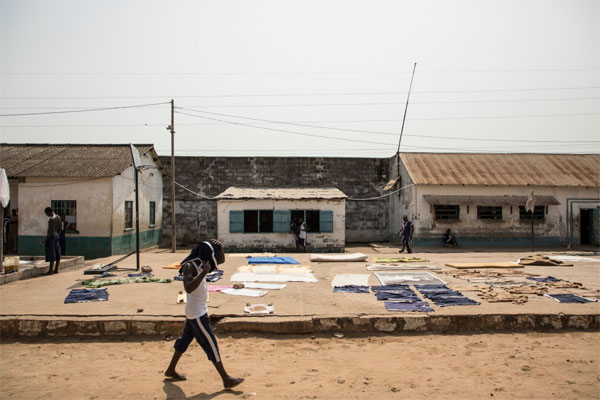 Exclusive images inside Mile 2 Prison, The Gambia - The exercise yard come laundry space - image © Helen Jones-Florio