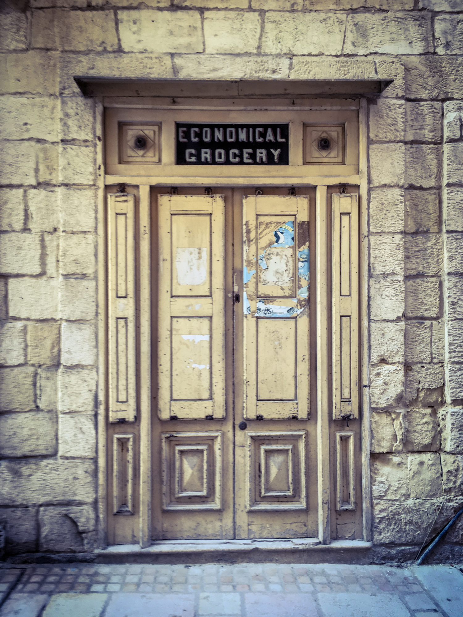 'Economical Grocery' - vintage storefront, in the Three Cities, Triq Hilda Trabone, Bormla (Cospicua), Malta ©Helen Jones-Florio