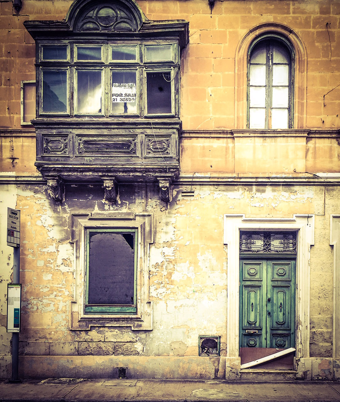 Malta Doors - derelict house and bus stop, Sliema, Malta © Helen Jones-Florio #DisappearingMalta