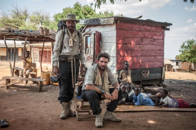 Portrait of British explorer Levison Wood with his walking partner Boston Beka during Wood's attempt to walk the length of the Nile from source to sea, Pawor village, Uganda. Image ©Jason Florio 