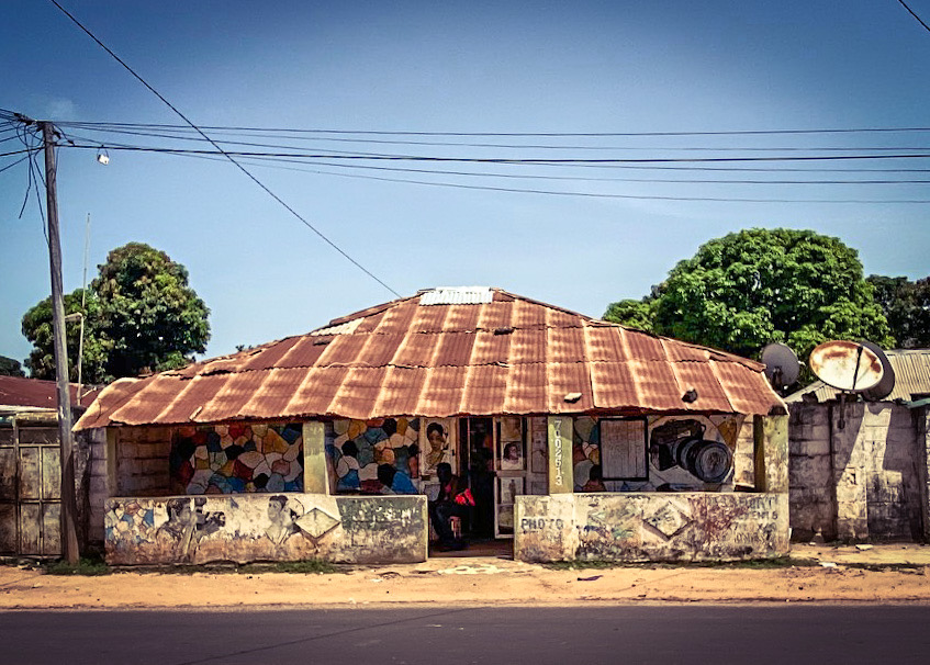 Gambia Doors: a local photography studio, with hand painted signs - in a suburban setting. Image ©Helen Jones-Florio