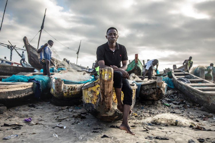 Isaac Mensah, James Town beach, Accra, Ghana © Jason Florio. Isaac is the son of one of 44 murdered Ghanian migrants, by Gambian security forces, in The Gambia, in 2005.