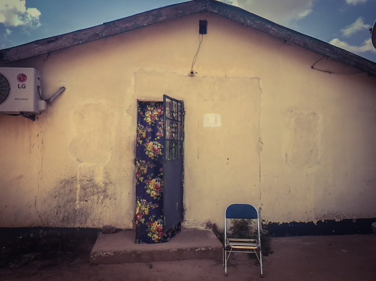 #GambiaDoors - a patterned curtain hanging in the doorway of a building in Kanifing, The Gambia. Image ©Helen Jones-Florio