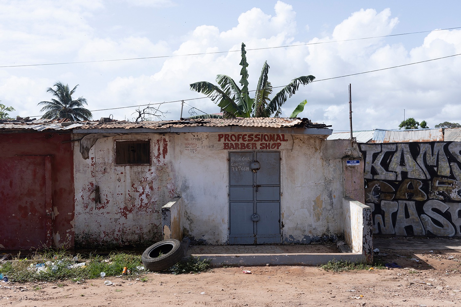 Photography Prints - African Doors by Helen Jones-Florio: 'Professional Barber Shop', Bakau, The Gambia, West Africa