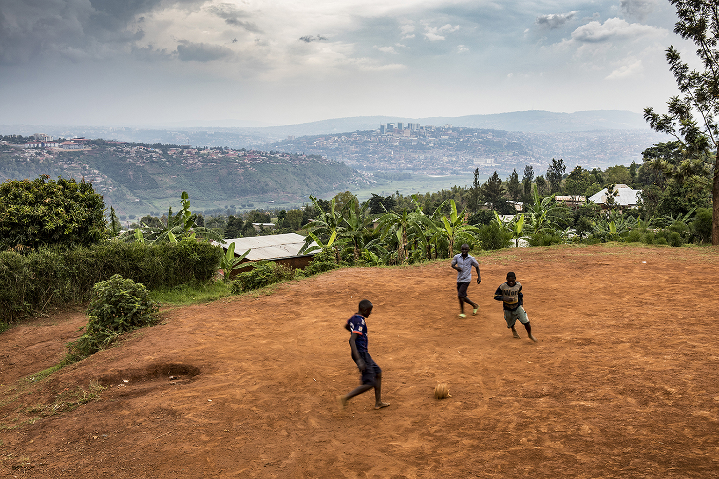 Photo of the Day: Scenic - Village boys playing football in the hillside village of Jali on the outskirts of Kigali. Image ©Jason Florio