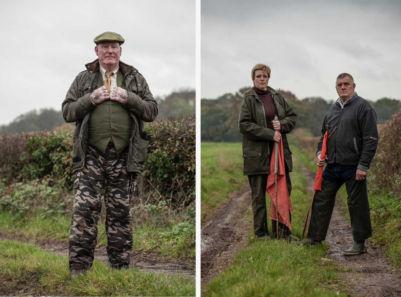 Portrait of Beaters and Pickers, standing in a field, at a pheasant shoot, Surrey UK. Image ©Jason Florio