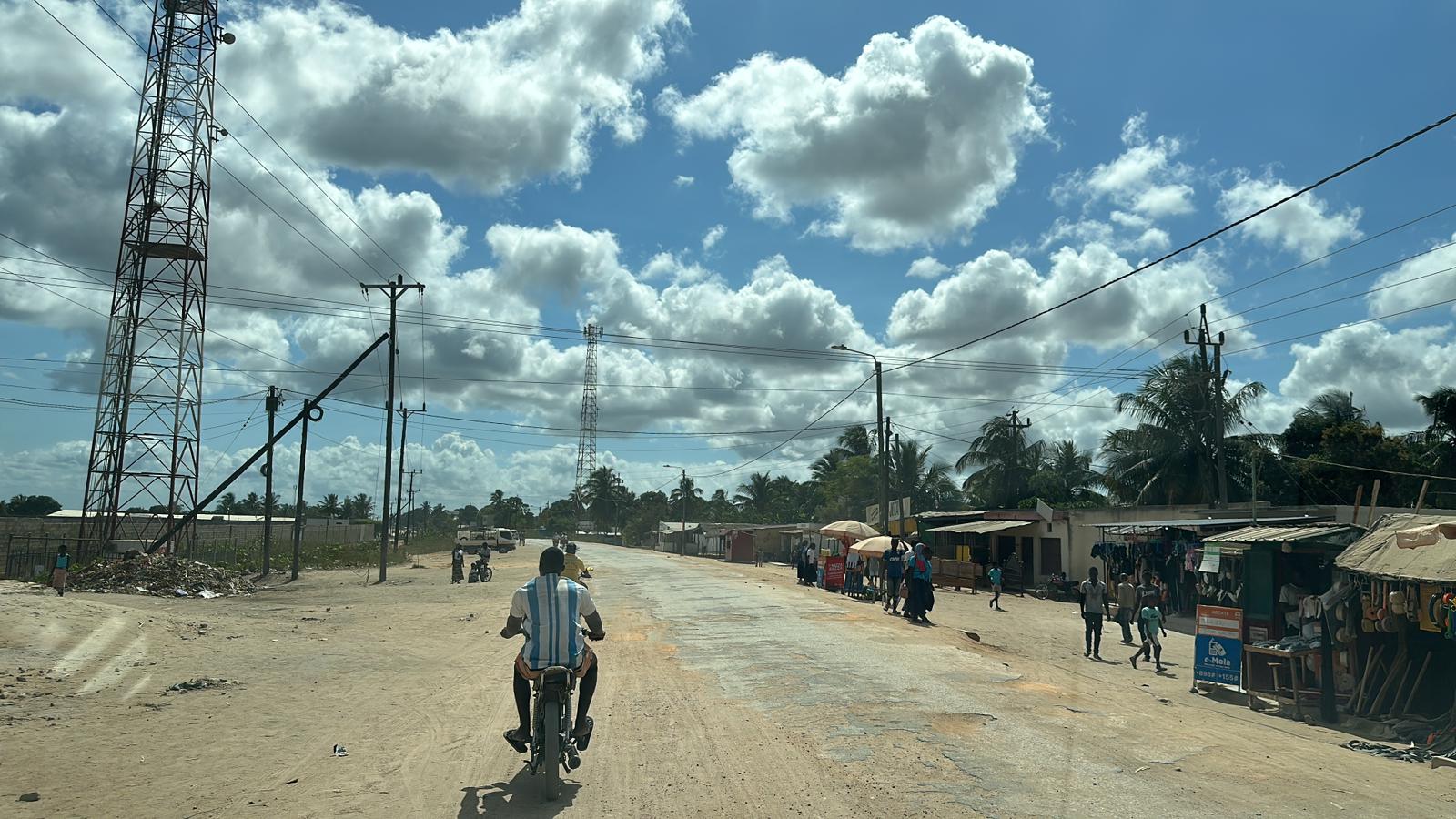 A man on a motorbike on the road in Nacala, Mozambique. Image © Jason Florio